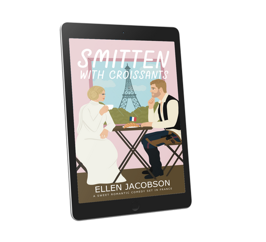 Smitten with Croissants romantic comedy set in France ebook cover showing woman wearing Princess Leia outfit and man wearing Han Solo outfit